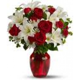 15 Red Roses And 5 White Lilies In A Vase